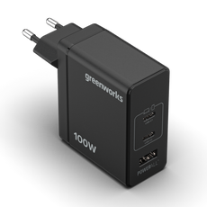 Black power adapter with multiple USB ports and 'greenworks' branding on a white background