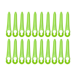 Set of green plastic tools with holes on a white background