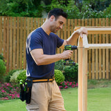 Man using a drill on a wooden project outdoors